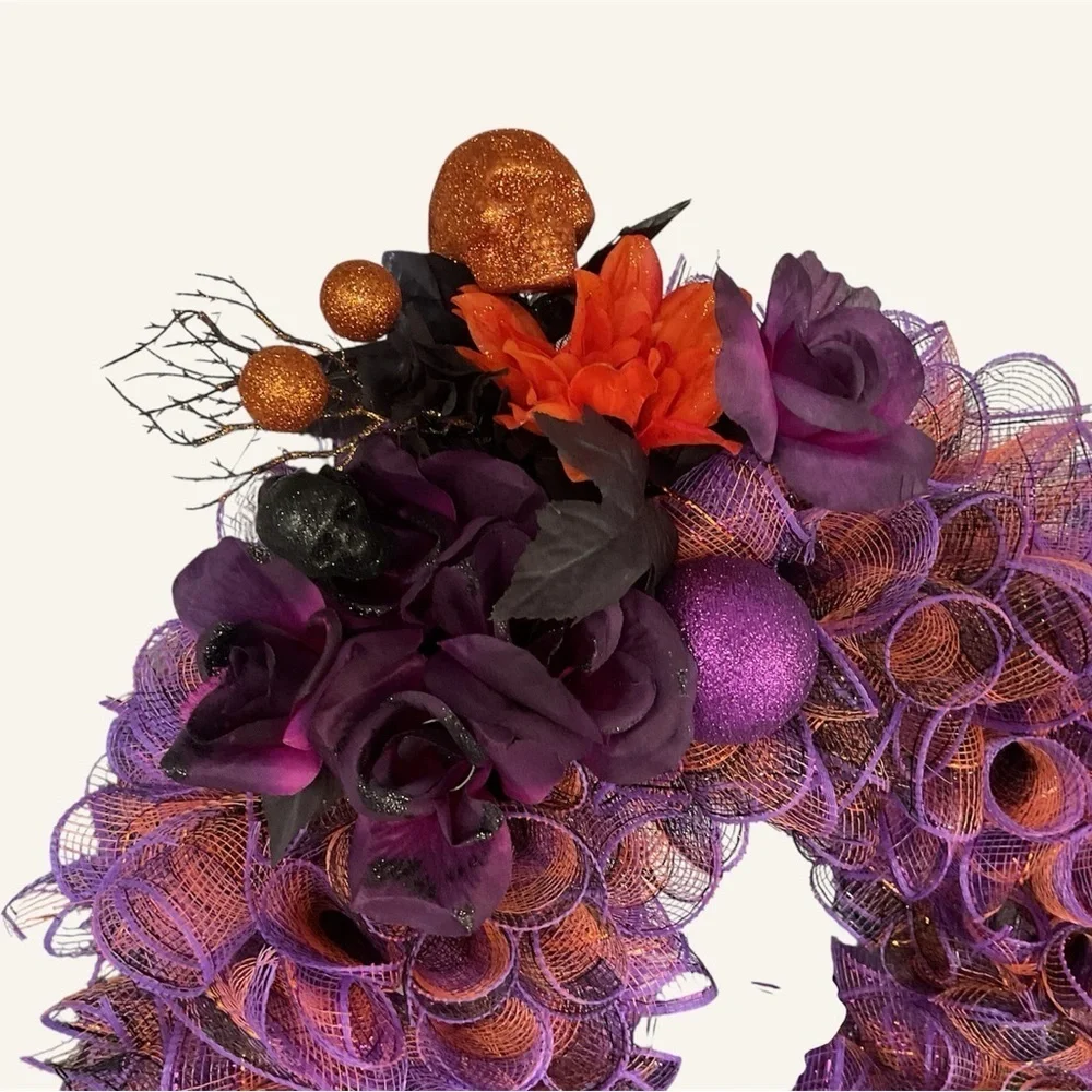 HALLOWEEN WREATH WITH PURPLE AND ORANGE ADORNED WITH FLOWERS AND SKULL HAND MADE